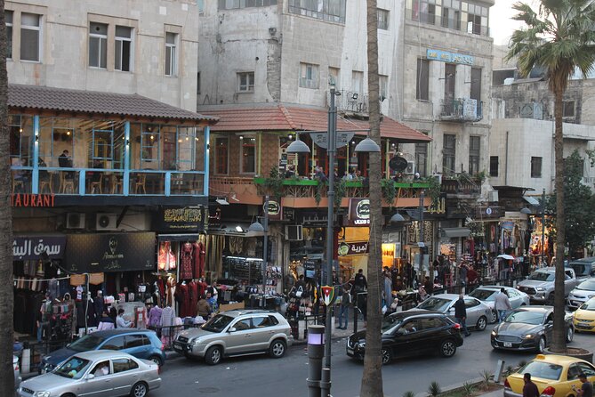 Day or Night Walking Tour in Downtown With Local - Grand Husseini Mosque, your orientation point for downtown