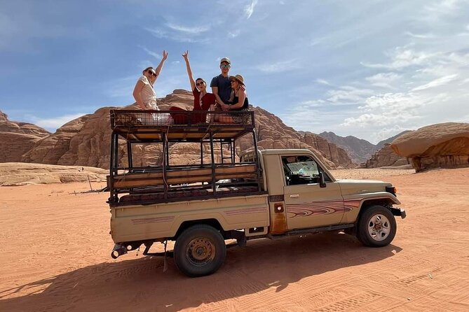 Full Day Jeep & Camel Tour No stay - Wadi Rum Planet Tour and Camp: canyon walk, carvings, and shade