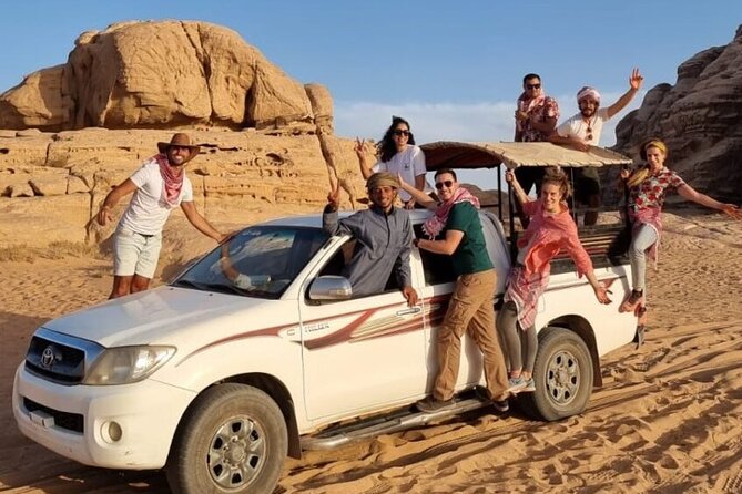 Full Day Jeep Tour with Overnight in Bedouin Camp - Red Sand Dunes, Sandboarding, and Movie-Set Famous Spots