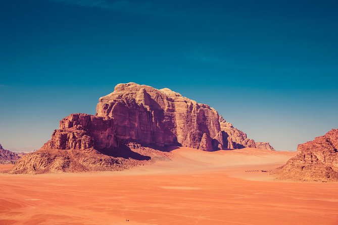 Jeep Tour in Wadi Rum with Professional Guide (Full day) - Lawrence of Arabia house, springs, rock cuts, and canyon drives
