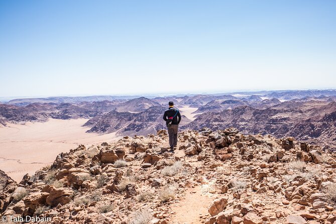 Jordan Active Adventure - 8 Days - Day 6: Jabal Umm Ad-Dami summit hike near the Saudi border, with desert cooked lunch