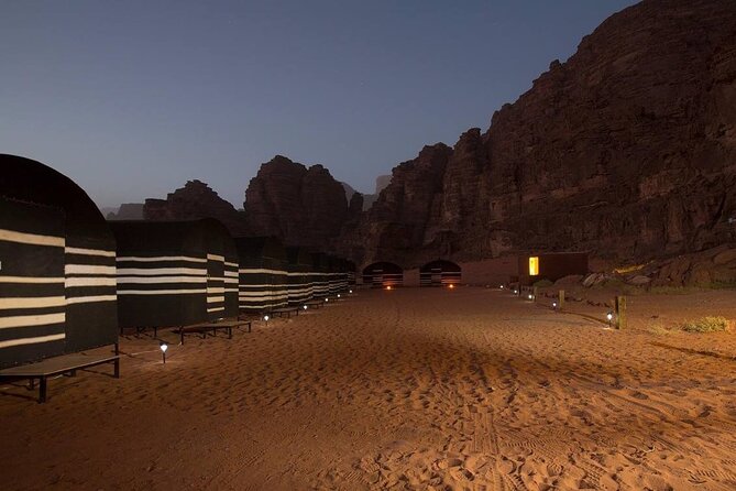 Private 1 Day Wadi Rum Desert Tour - Sunset bivouac at Badawa Camp: dinner, campfire, and real star time