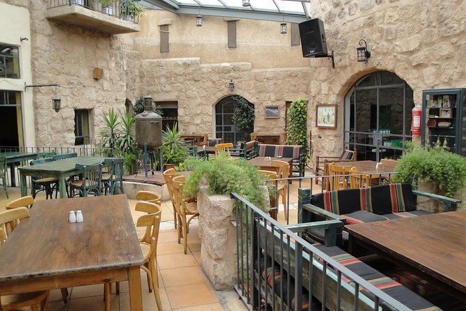 Private Madaba Haret Jdoudna Restaurant Lunch or Dinner from Amman - Inside Haret Jdoudna: Fireplace Atmosphere and Mezze You Can Build