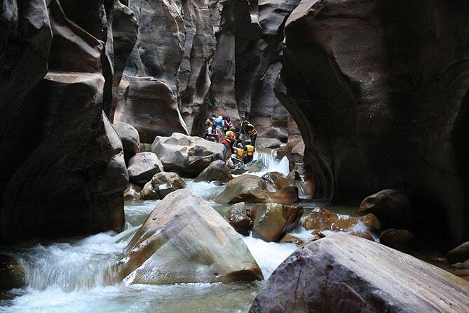 Wadi Al Mujib Adventures From Amman, QAI Airport, Deadsea or Madaba - The wet water trail reality check: shallows, rope sections, and ladders