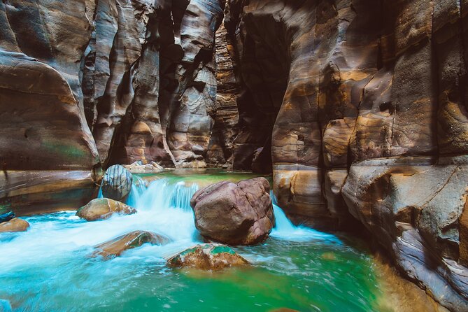 Wadi Mujib Siq Trail with Amman Panoramic&Optional Dead Sea Visit - Reaching the waterfall zone about an hour in