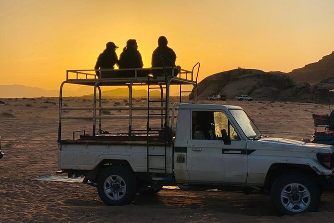 Wadi Rum Full Day Jeep Tour + Overnight & Dinner in Bedouin Camp - Red sand dune, little bridge, and the Umm Fruth photo climb