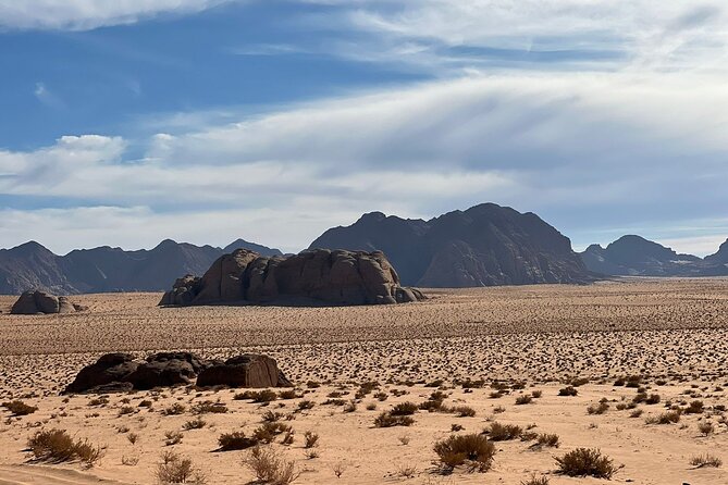 Wadi Rum Half-Day 4x4 and Camel Tour - Camel ride and sandboarding: fun, but plan your expectations