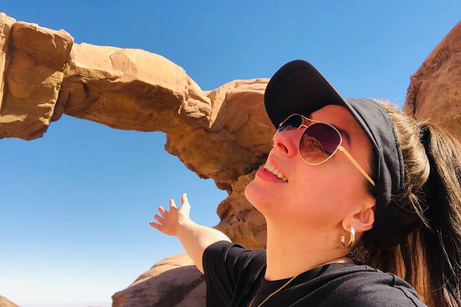 Wadi Rum Mountain Hike & Climb: Burdah, with a bridge at the top! + tour & Lunch - Abu Khashaba Canyon walk: narrow walls, green contrast, and bird-bottle details