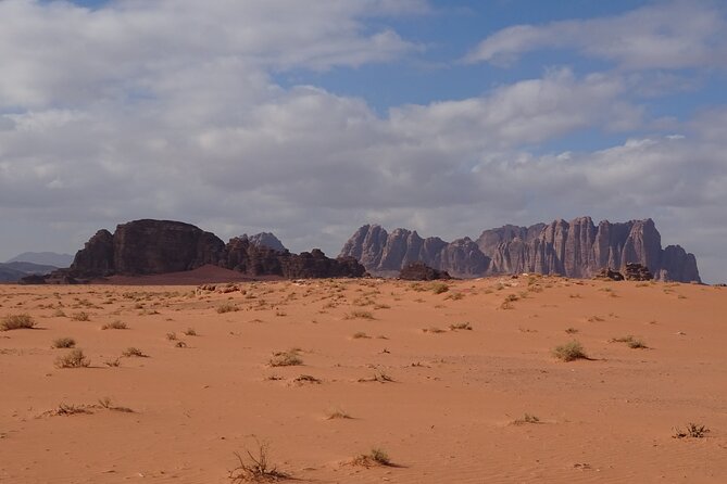 Wadi Rum Mountain Hike: Umm Ad Dami, highest point of Jordan + Jeep tour & Lunch - Caves by jeep and the Um Sabatah sunset tea moment